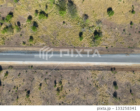 Straight empty asphalt road Straight empty asphalt road 133258341