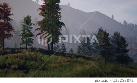 Majestic mountains rise in the distance as colorful trees stand tall. Morning light filters through the foliage, creating a peaceful atmosphere in the forest glade. 133258873