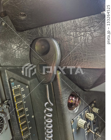 Handheld Radio Microphone in Aircraft Cockpit Handheld Radio Microphone in Aircraft Cockpit 133264525