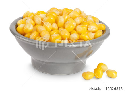 corn seeds in ceramic bowl isolated on white background with full depth of field 133268384