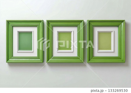 Modern stylish. Interior. Mock up for modern interior and branding. Empty green photo frame for a collage of three photos in a minimalist style on a white background. Green stylish photo frame. 133269530