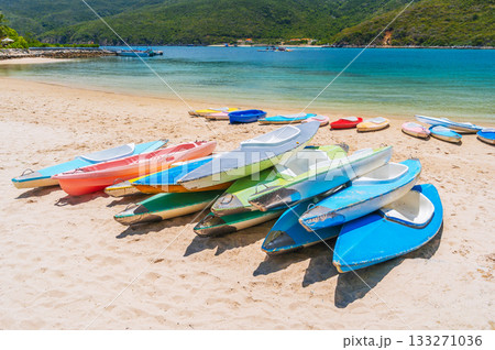 Kayaks on sandy beach by sea in lagoon in summer on vacation on 133271036