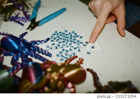 production of three-dimensional plastic toys at factory. 3D printers, modern technologies. production of three-dimensional plastic toys at factory. 3D printers, modern technologies. 133271054