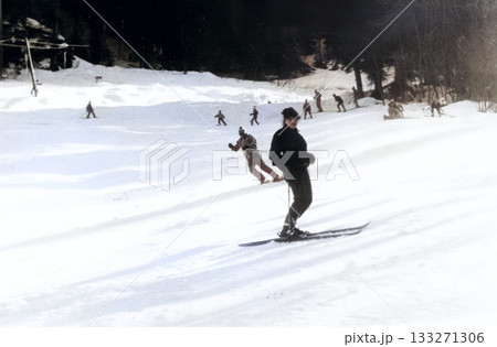 Vintage portrait of a young athletic woman on a ski slope. Retro photo 1985. 133271306