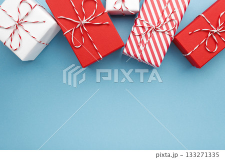 Gift boxes on color background, flat lay, space for text 133271335