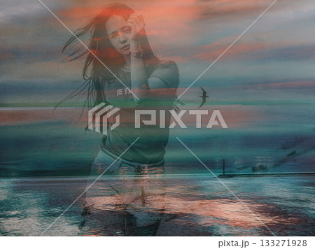 Woman by the sea at sunset with a bird flying in the sky. A beautiful woman walking near the ocean, a bird soaring in a sky. A dreamy, artistic shot Woman by the sea at sunset with a bird flying in the sky. A beautiful woman walking near the ocean, a bird soaring in a sky. A dreamy, artistic shot 133271928