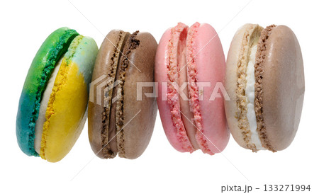Stack of four colorful macarons blue, yellow, brown, and pink. Dessert on an isolated background 133271994