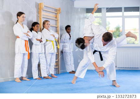 Coach and boy training judo technique Coach and boy training judo technique 133272873