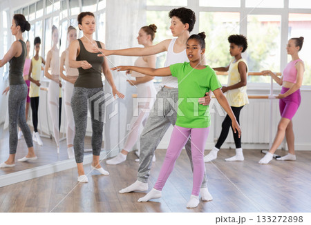Teenage boy and girl rehearsing ballet choreography 133272898