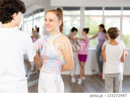 Teenage boy and girl dancing waltz Teenage boy and girl dancing waltz 133272947
