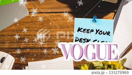 Featuring blue sticky note pinned with push pin on wooden desk in office, with Vogue overlay Featuring blue sticky note pinned with push pin on wooden desk in office, with Vogue overlay 133278969