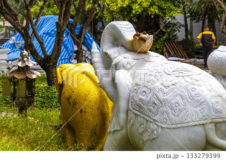 White and golden Thai temple elephant dragons in Patong Thailand. White and golden Thai temple elephant dragons in Patong Thailand. 133279399