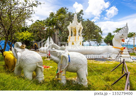 White and golden Thai temple elephant dragons in Patong Thailand. White and golden Thai temple elephant dragons in Patong Thailand. 133279400