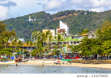 Patong Beach Phuket with people promenade sun loungers parasols Thailand. Patong Beach Phuket with people promenade sun loungers parasols Thailand. 133279405