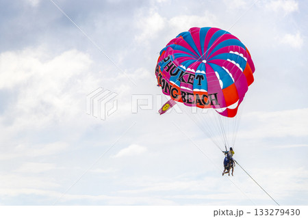 Patong Beach Phuket with parachute sport and parasailing activity Thailand. 133279430