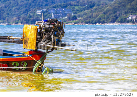 Longtail boat long tail boats at the Patong Beach Thailand. 133279527
