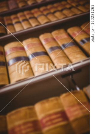 Low angle view of yellow books on shelf 133281265