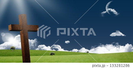 Wooden cross is standing on green hill in flat design with sunbeams, clouds and crescent moon 133281286