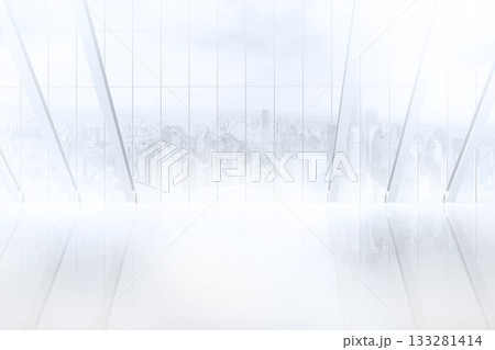 White room with large window overlooking city 133281414