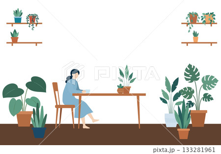 観葉植物に囲まれた落ち着いた室内時間を過ごす女性 観葉植物に囲まれた落ち着いた室内時間を過ごす女性 133281961