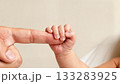 Newborn Baby Hand Gripping Parent Finger Trust Bond 133283925