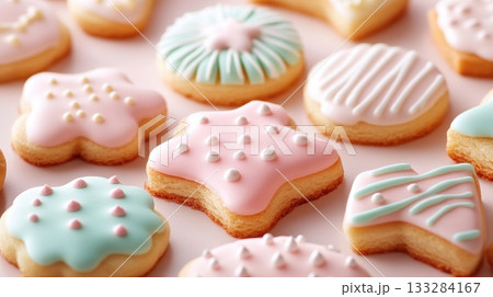 Beautifully decorated pastel cookies arranged on a table showcasing intricate designs and vibrant colors during a cheerful celebration 133284167