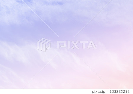 Pastel sky purple pink blue with white cloud.  133285252