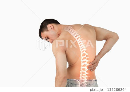 Highlighted spine of man with back pain Highlighted spine of man with back pain 133286264