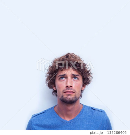 Flat design showing man standing on blue backdrop, wearing blue tee, showing concerned expression 133286403