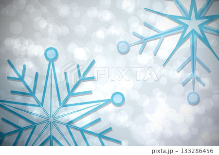 Blue snowflake pattern on twinkling lights 133286456