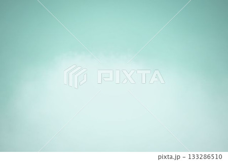 Irregular white cloud-like shape is floating on flat gradient design backdrop with vignette Irregular white cloud-like shape is floating on flat gradient design backdrop with vignette 133286510