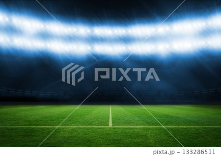 Football pitch under blue lights 133286511