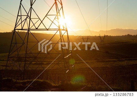 The evening electricity pylon silhouette The evening electricity pylon silhouette 133286783