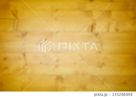 Blurred horizontal wooden plank surface is showing in flat design, featuring grain lines and knots 133286808