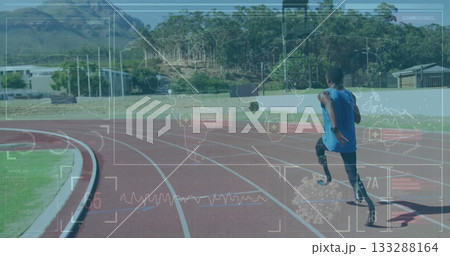 Speeding teen sprinter wearing prosthetic blades rounding red track with data overlay, copy space Speeding teen sprinter wearing prosthetic blades rounding red track with data overlay, copy space 133288164