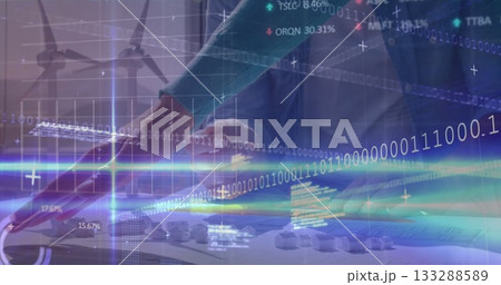 Adjusting hand wearing blazer manipulating wind farm model in tech office with digital data overlay Adjusting hand wearing blazer manipulating wind farm model in tech office with digital data overlay 133288589