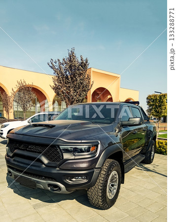a powerful modern off-road pickup truck at an exhibition on a sunny day a powerful modern off-road pickup truck at an exhibition on a sunny day 133288771