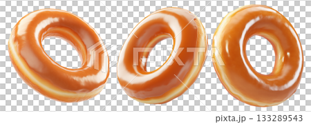 Tasty round donut topped with caramel and vanilla glaze swirl, isolated on white transparent background 133289543