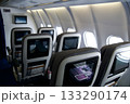 Frankfurt, Germany, June 10, 2019: Premium Economy Cabin with Multiple Seat Rows on a Long Haul Aircraft 133290174