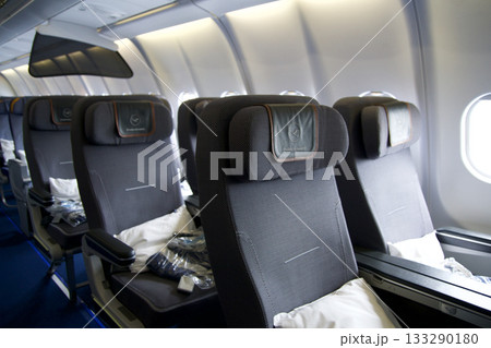 Frankfurt, Germany, June 10, 2019: Premium Economy Cabin with Multiple Seat Rows on a Long Haul Aircraft 133290180