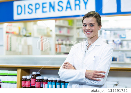 Woman pharmacist handling prescription containers on counter at pharmacy dispensary, copy space Woman pharmacist handling prescription containers on counter at pharmacy dispensary, copy space 133291722