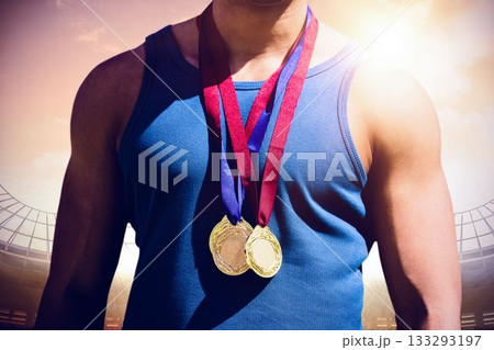 Midsection of medalist at stadium during sunset Midsection of medalist at stadium during sunset 133293197