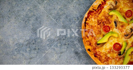 Overhead view of pizza on table 133293377