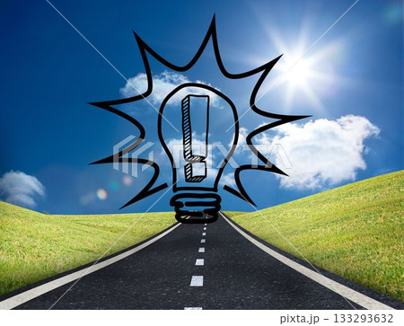 Light bulb graphic on bright countryside 133293632