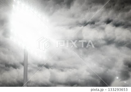 Stadium floodlight fixture is shining through heavy rain and stormy sky in flat design 133293653