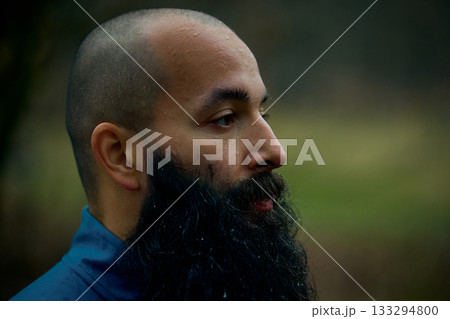 Focused runner portrait after intense forest workout 133294800