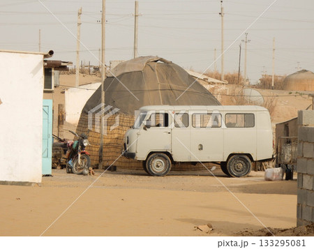A Soviet-style UAZ van at Yerbent Desert Village in rural Turkmenistan 133295081