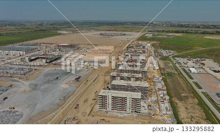 Industrial construction site with construction equipment and materials 133295882