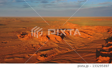 Bayanzag flaming cliffs at sunset in Mongolia Bayanzag flaming cliffs at sunset in Mongolia 133295897