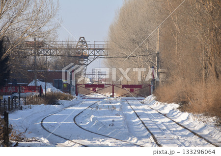 A railway track covered in snow leading into the Unit 731 Prison Camp A railway track covered in snow leading into the Unit 731 Prison Camp 133296064